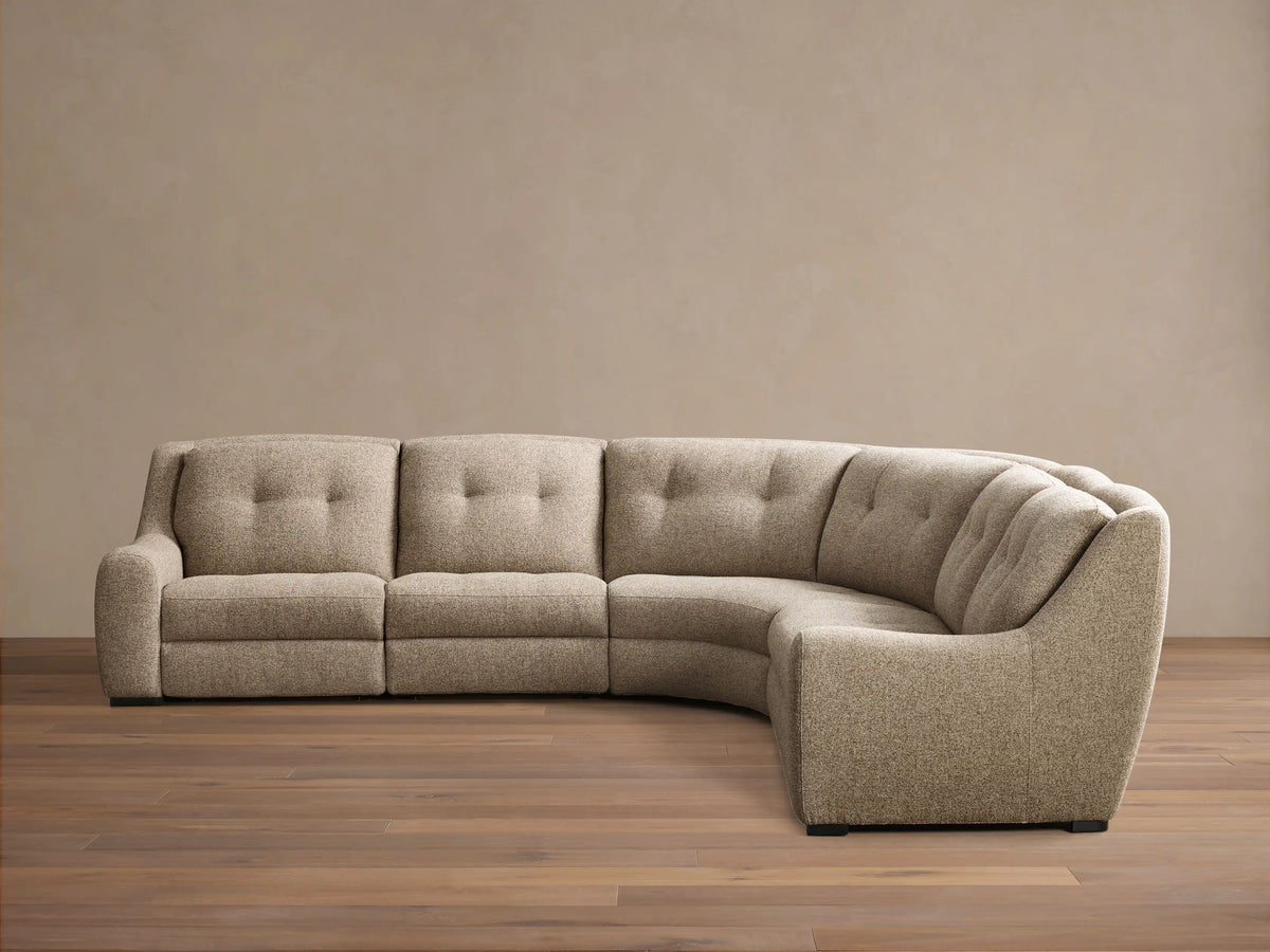 Front view of the light beige heathered L-shaped Perry Five-Piece Motion Corner Sectional with button-tufted backs.