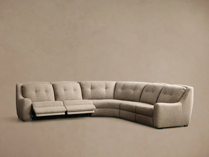 Front view of the oatmeal Perry Five-Piece Motion Corner Sectional with its right-arm recliner extended.