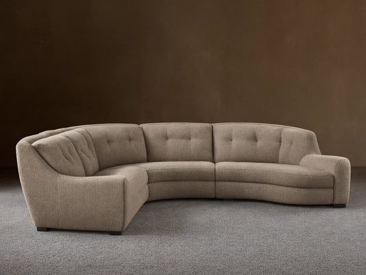 Front view of the light beige heathered L-shaped Perry Five-Piece Motion Corner Sectional with button-tufted backs.