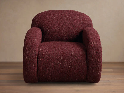 Front view of the burgundy Algiers Swivel Chair, featuring a plush, rounded silhouette and curved arms in textured fabric.
