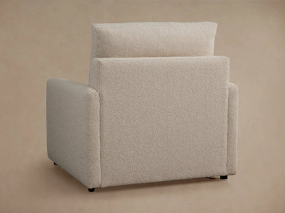 Kipton Motion Recliner in beige fabric, side view, with footrest extended. Slim arm design, set against a neutral background.