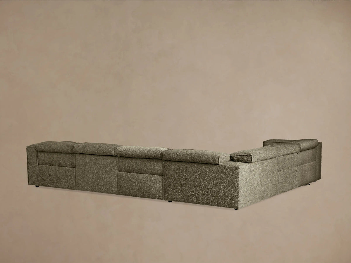 Coburn Six-Piece Motion Sectional, dark taupe L-shaped sofa, with the left recliner section extended, on a plain background.