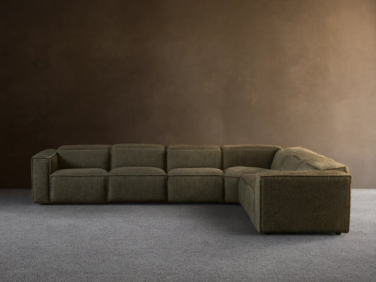 Coburn Six-Piece Motion Sectional, L-shaped, in deep olive textured fabric against a light wall on a wood floor.