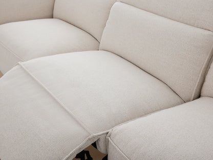 Light grey Coburn Five-Piece Motion Corner Sectional, L-shaped, against a neutral wall on a wood floor.