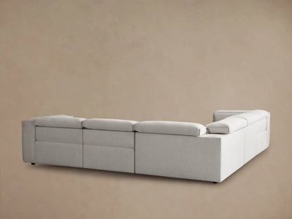 Close-up of Coburn Five-Piece Motion Corner Sectional armrest and cushions in light gray textured fabric.