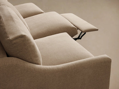 Front view of the beige Kipton Slope Arm Three-Piece Motion Modular Sofa with three cushions and three motion bases.