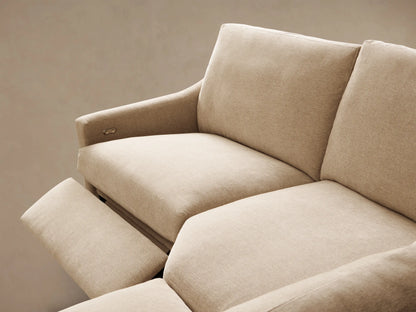 Close-up of the beige Kipton Slope Arm Four-Piece Motion Sectional, showing the motion control button on the armrest.