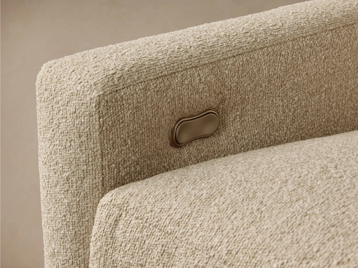 Front view of the beige Kipton™ Slope Arm Four-Piece Motion Sectional, an L-shaped sofa with sloping arms.