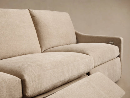 Close-up of the beige woven fabric on the Kipton Slope Arm Four-Piece Motion Modular Sofa™ with a silver motion control panel.