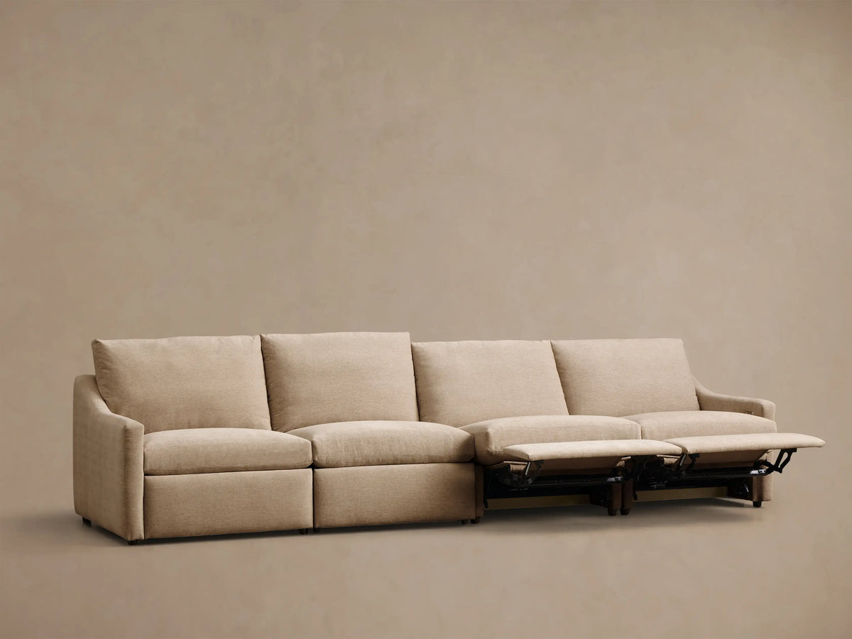 Rear view of the beige Kipton Slope Arm Four-Piece Motion Modular Sofa.