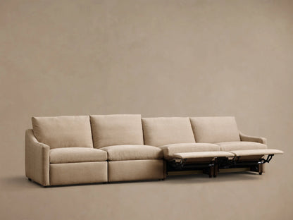 Rear view of the beige Kipton Slope Arm Four-Piece Motion Modular Sofa.