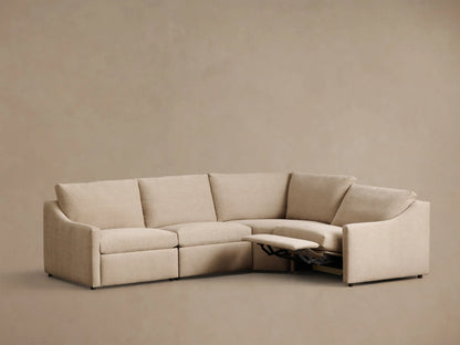 Front view of the beige Kipton Slope Arm Four-Piece Motion Sectional, an L-shaped sofa with two reclining sections and sloped arms.