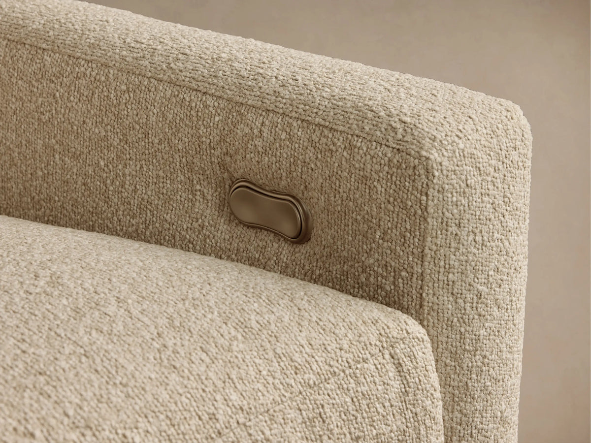 Front view of the beige Kipton Slope Arm Four-Piece Motion Sectional, an L-shaped sofa with sloping arms.
