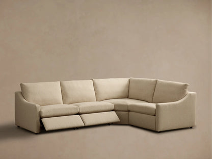 Rear view of the beige Kipton Slope Arm Four-Piece Motion Sectional, featuring its textured boucle fabric and four modular sections.