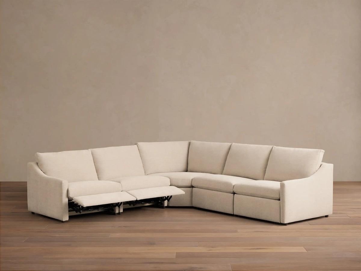 Rear view of the light beige Kipton Slope Arm Five-Piece Motion Corner Sectional.
