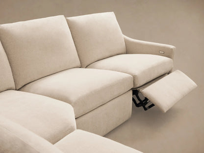 Front view of the Cream Kipton Slope Arm Five-Piece Motion Corner Sectional with one footrest extended.