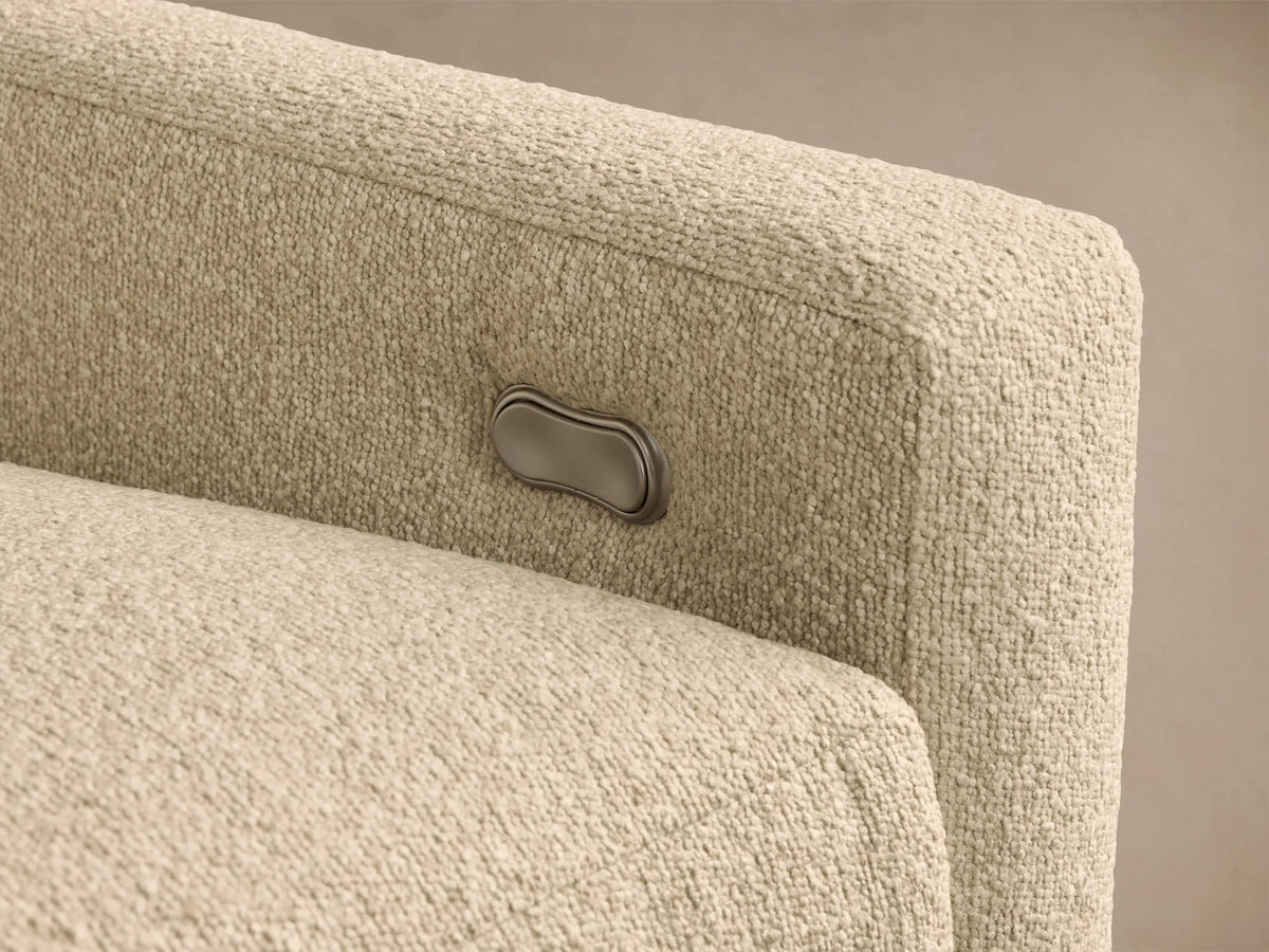 Front view of the beige Kipton Slope Arm Five-Piece Motion Corner Sectional with one seat's footrest extended.