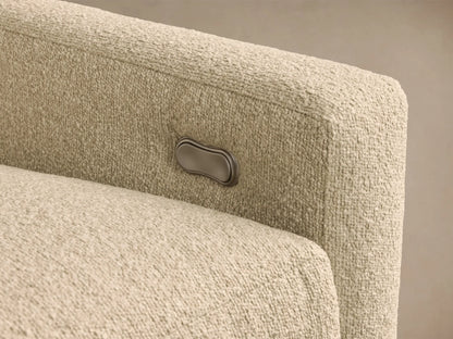 Front view of the beige Kipton Slope Arm Five-Piece Motion Corner Sectional with one seat's footrest extended.