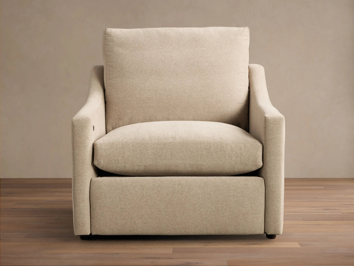 Front view of the light beige textured Kipton Slope Arm Motion Recliner with distinct slope arms and a rectangular back cushion.