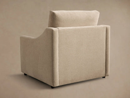 Close-up of a beige Kipton Slope Arm Motion Recliner, partially reclined with extended footrest and armrest control button.