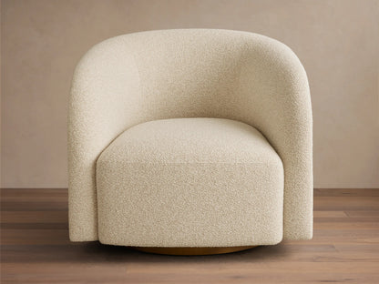 Front view of the cream Finnley Swivel Chair, featuring rounded arms and back, upholstered in a textured boucle fabric.