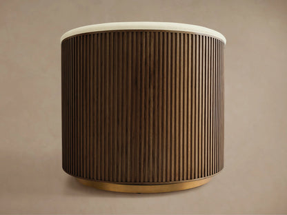 Finnley Swivel Chair with curved, wooden slatted back in dark finish, cream cushioned top, on a round wooden base, side view.