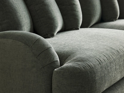 Angled Hanover Sofa in textured dark green fabric with rolled arms, five plush back cushions, and tapered wood legs.