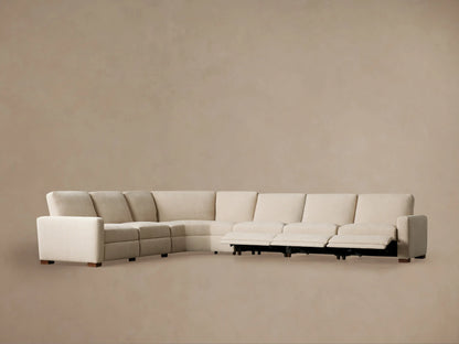 Remington Motion Sectional, close-up of a beige woven fabric seat with an extended footrest for reclining.