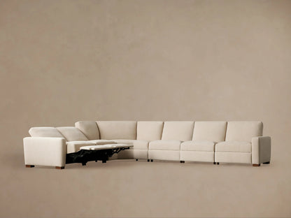 Light beige U-shaped Remington Six-Piece Motion Sectional with two right recliners partially extended, against a neutral wall.