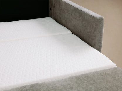 Reece Sleeper Sofa in light grey fabric, front view, with two back & two seat cushions, square arms with stitched detail.