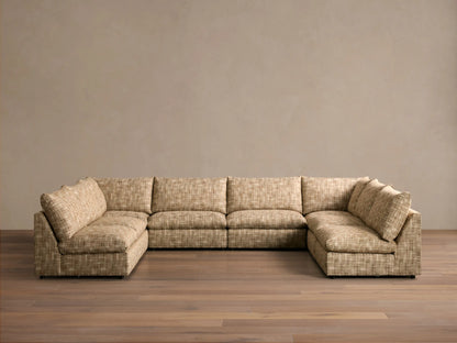 Front view of the heathered beige Calistoga Eight-Piece Sectional, configured in a large U-shape.
