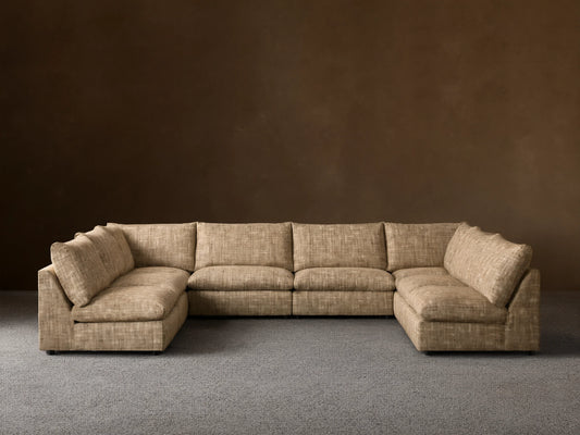 Front view of the heathered beige Calistoga Eight-Piece Sectional, configured in a large U-shape.