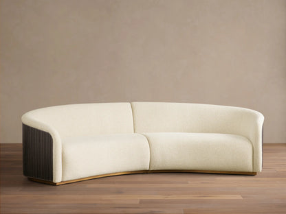 Front view of the cream Finnley Two-Piece Curved Sectional with Ebony slatted wood arms and Honey wood base.