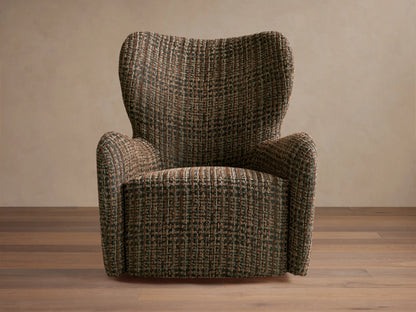 Gemma Swivel Chair with a textured, tweed-like fabric in earthy tones; curved backrest and armrests on a wooden floor.