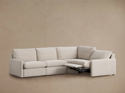 Kipton Four-Piece Motion Sectional in beige fabric, showcasing two extended recliners with slim arms, against a neutral background.