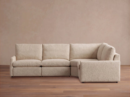 Kipton Upholstered 126"W Four Piece Left Arm Motion Sectional in Promise Ecru (1 of 1)