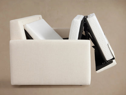 Kipton Luxury Sleeper Sofa with cream upholstery, partially extended into a sleeper. Features a white quilted mattress surface.