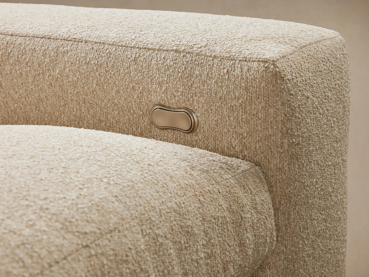 Kipton Wide Arm Three-Piece Motion Modular Sofa in beige fabric, featuring wide arms, three seat cushions, and three backrests.