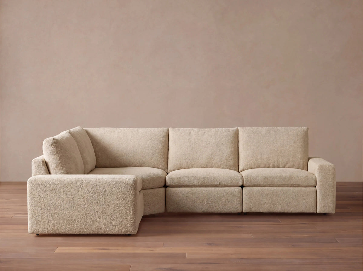 Kipton Wide Arm Upholstered 131"W Four Piece Left Arm Motion Sectional in Promise Ecru (1 of 1)