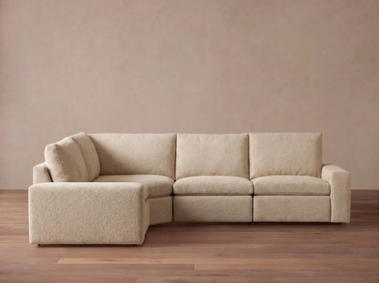 Kipton Wide Arm Upholstered 131"W Four Piece Left Arm Motion Sectional in Promise Ecru (1 of 1)