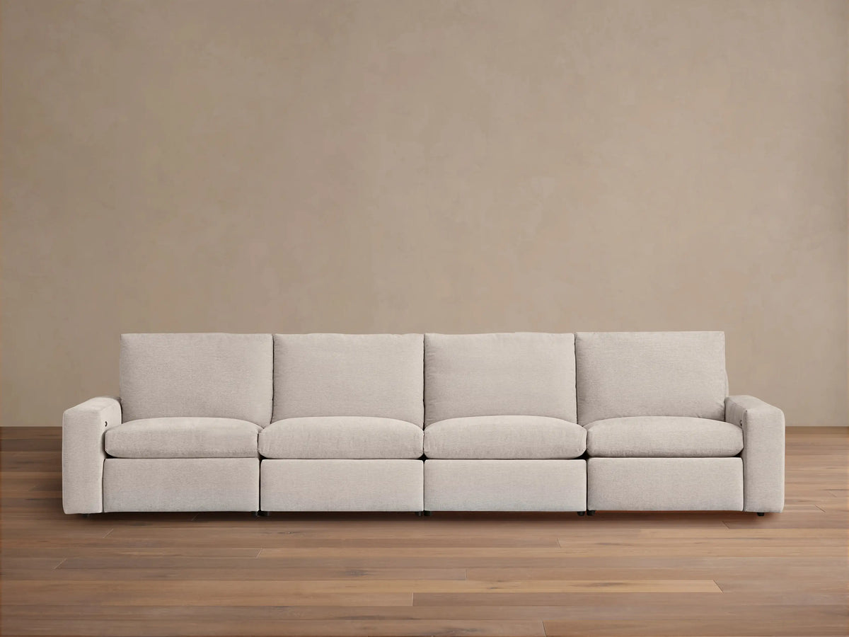 Kipton Wide Arm Four-Piece Motion Modular Sofa