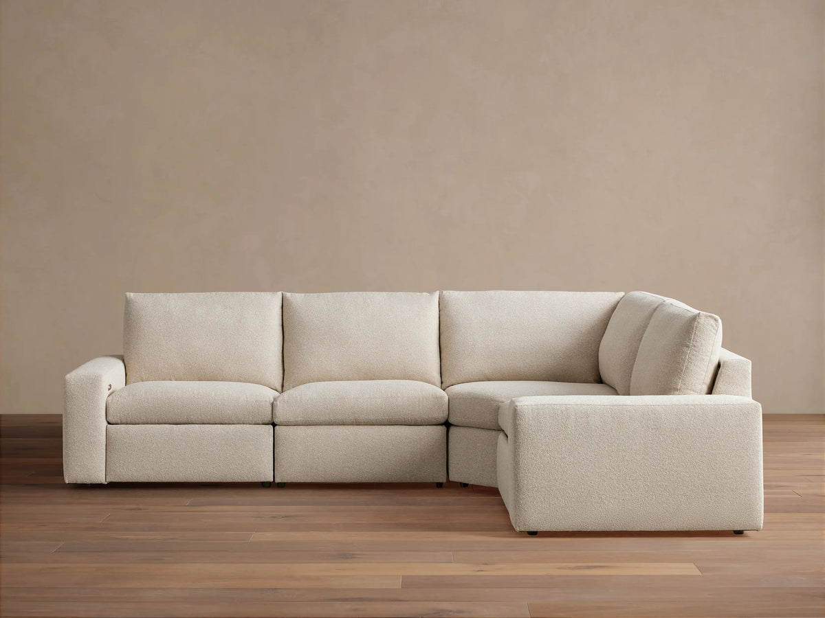 Kipton Wide Arm Four-Piece Motion Sectional
