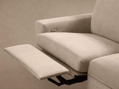 Kipton Wide Arm Six Piece Motion Sectional in beige fabric. L-shaped, wide arms, open reclined section on the right.