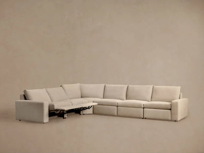 Kipton Wide Arm sectional showing a close-up of the beige fabric armrest with a sleek, metallic two-button motion control.