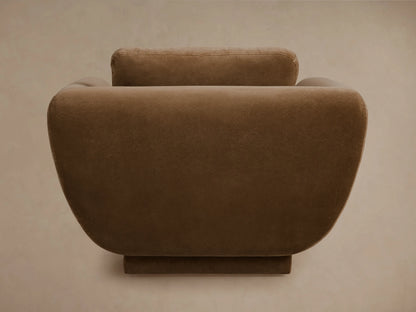 Fontana Swivel Chair, back view. Rounded, modern design upholstered in a warm taupe fabric, with a supportive back cushion.