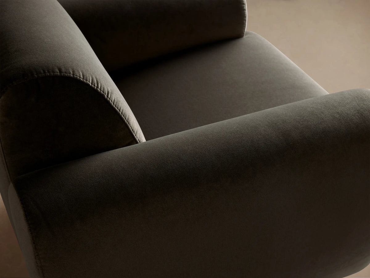 Gianni Swivel Chair: Deep green-gray, textured fabric with a square back, plush seat, and thick, rounded arms, on wood floor.