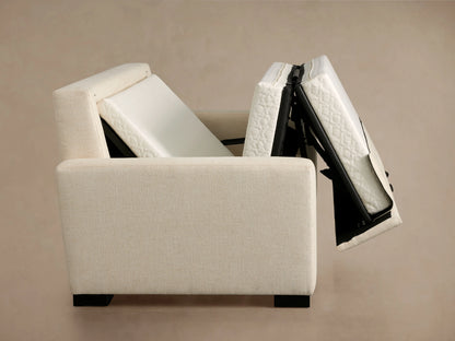 Angled rear view of a cream-colored Remington Luxury Sleeper Sofa with square arms, textured fabric, and black block feet.