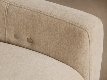 Rowland Tailored Three-Piece Motion Modular Sofa in light beige textured fabric, full front view against a tan wall.