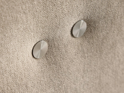 Rowland Tailored Four-Piece Armless Motion Modular Sofa, light oat fabric. Four armless sections, leftmost slightly reclined.