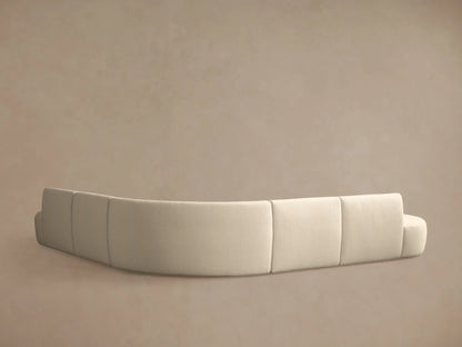 Close-up of Lovina Five-Piece Corner Sectional in light beige textured fabric, showing its curved design.